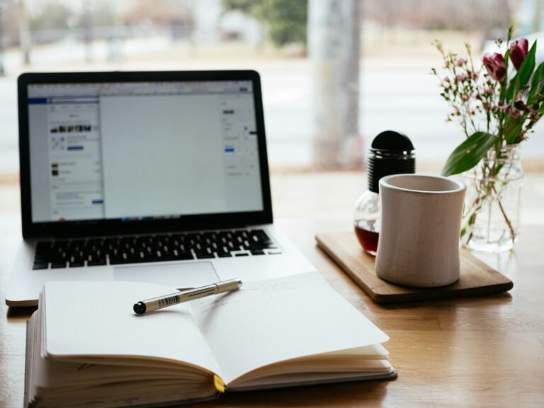 Beginner at a laptop starting a 7-day vibe coding plan to build a first AI app