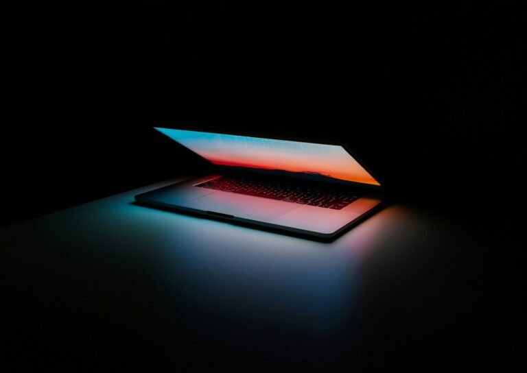 Developer laptop open on a desk representing free vibe coding tools without a credit card