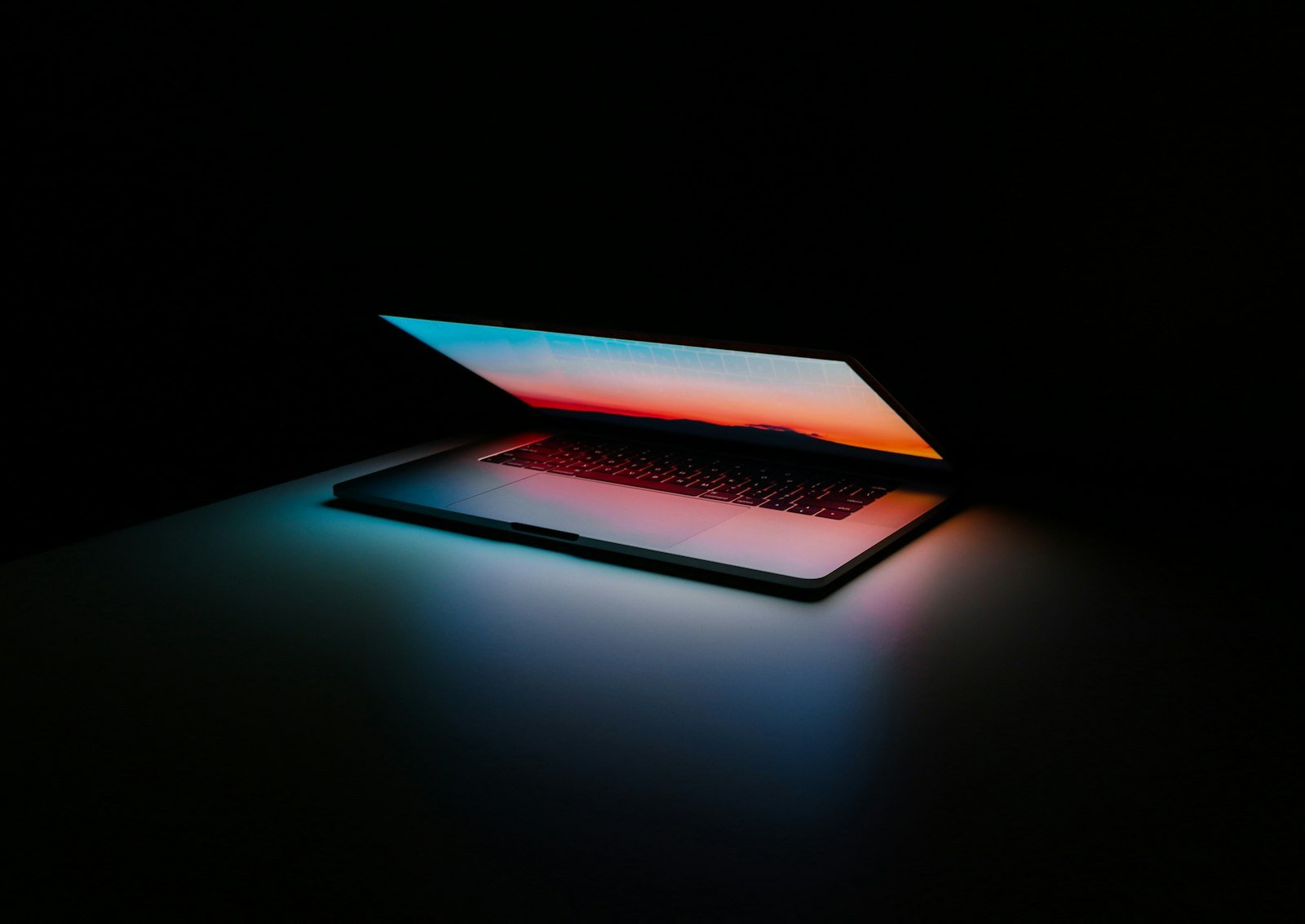 Developer laptop open on a desk representing free vibe coding tools without a credit card