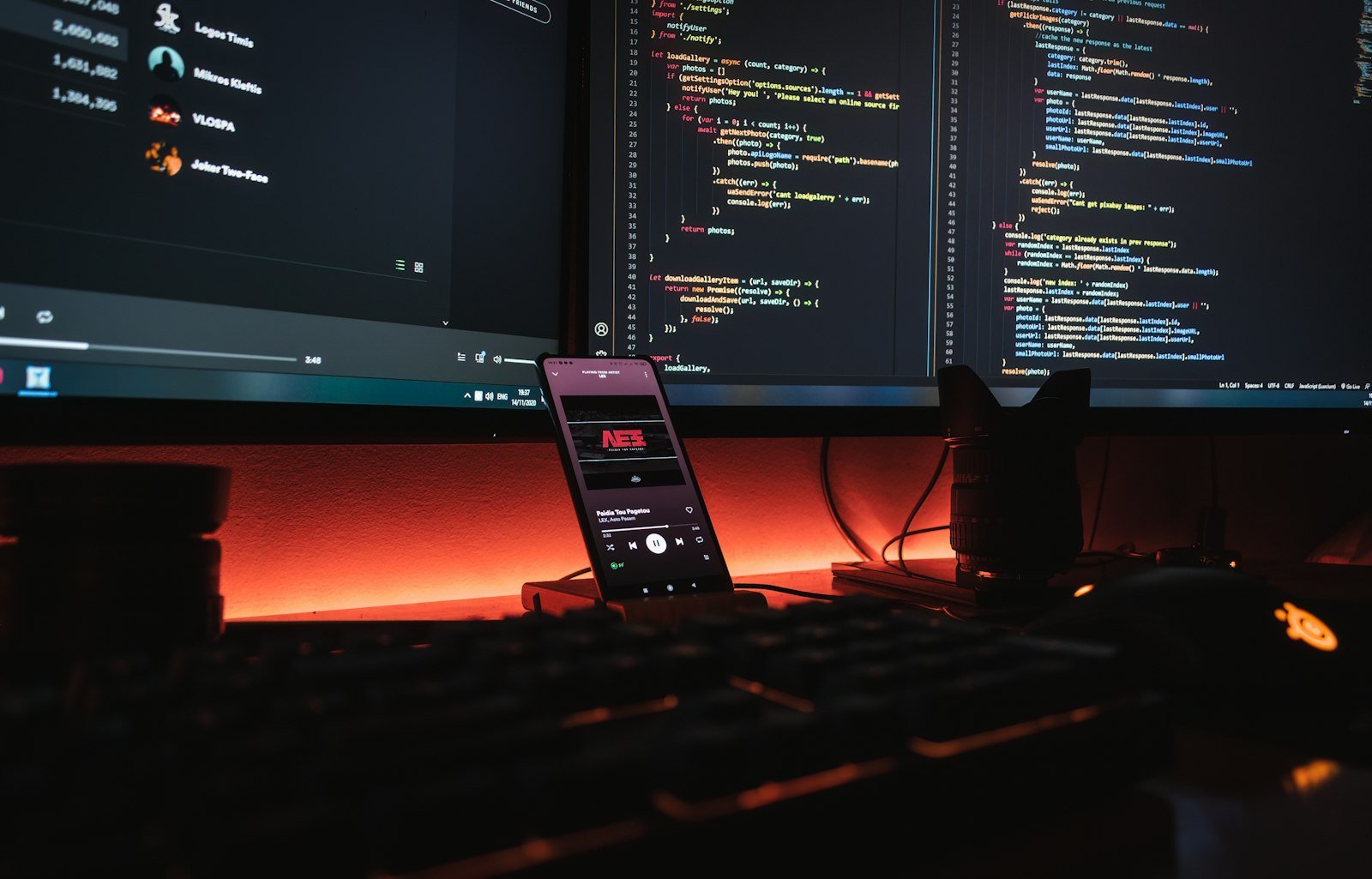 Coding workspace with monitors used to compare free forever vs free trial AI coding plans