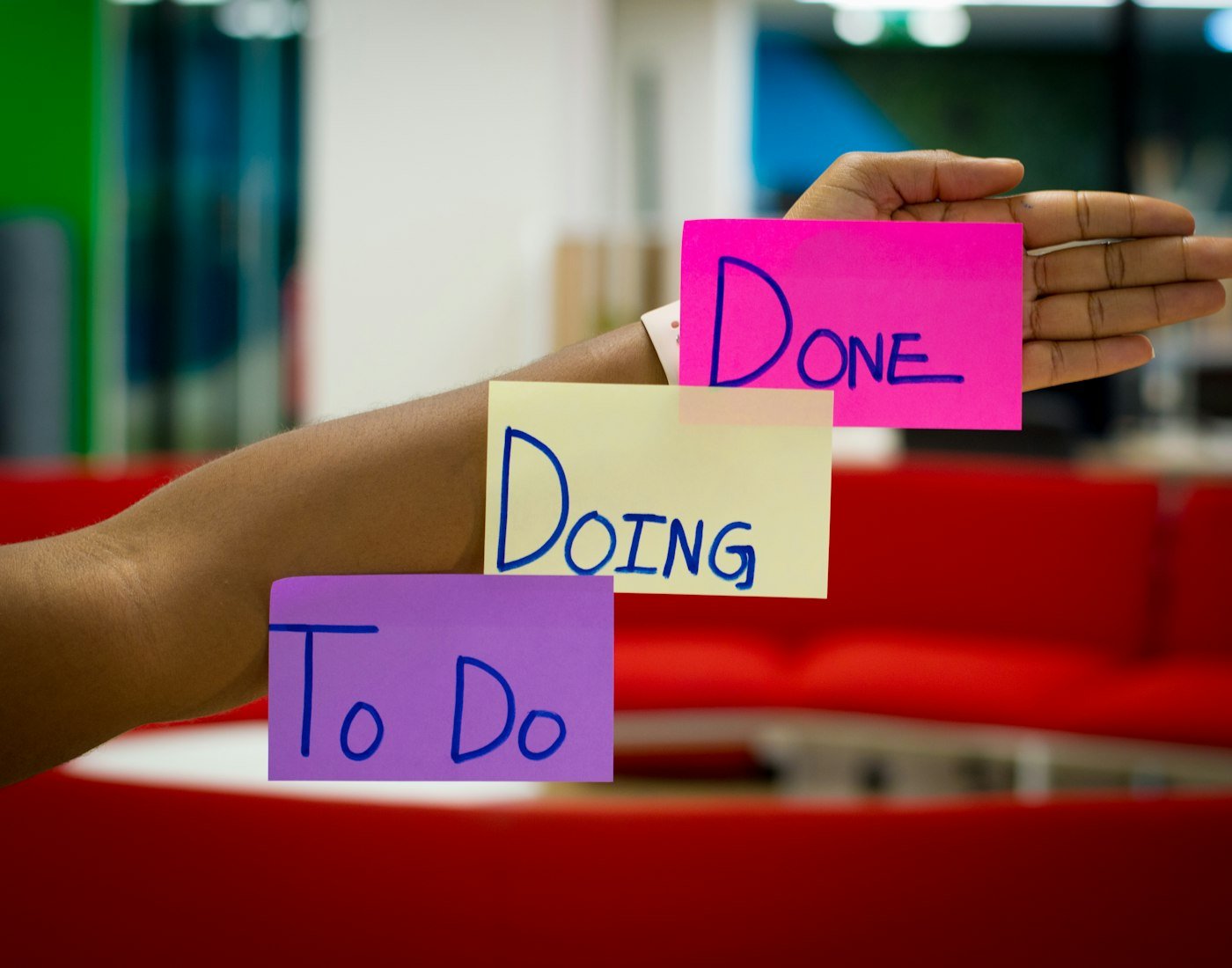 Developer sketching a simple product roadmap before opening an AI coding tool